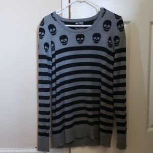 Black and gray striped sweater with skulls